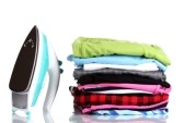 12436237-pile-of-colorful-clothes-and-electric-iron-isolated-on-white.jpg